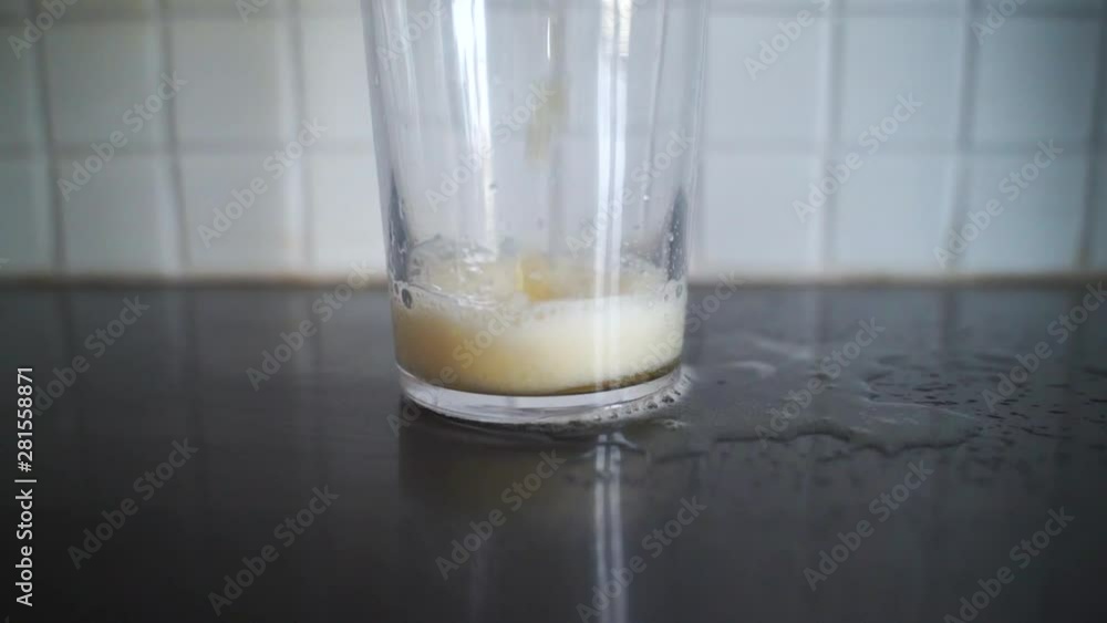 Beer pouring into glass. Slow motion zoom in video footage. Beer pouring into glass. Slow motion zoom in video footage.