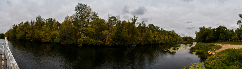 river in the forest in autumn panorama river in the forest in autumn panorama