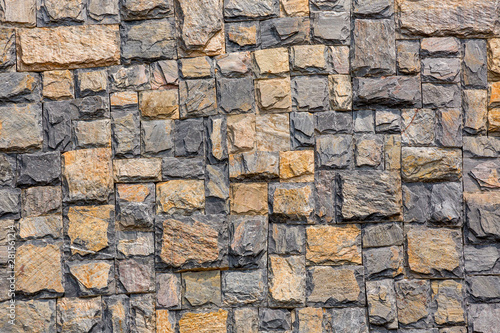 Colorful stone wall pattern for background.
