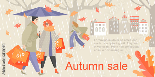 Couple with umbrella and big shopping bags on a background of an autumn city landscape