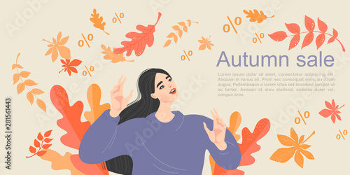 Fototapeta Naklejka Na Ścianę i Meble -  Symbolic image of the autumn sale with a happy girl on a background of leaf fall