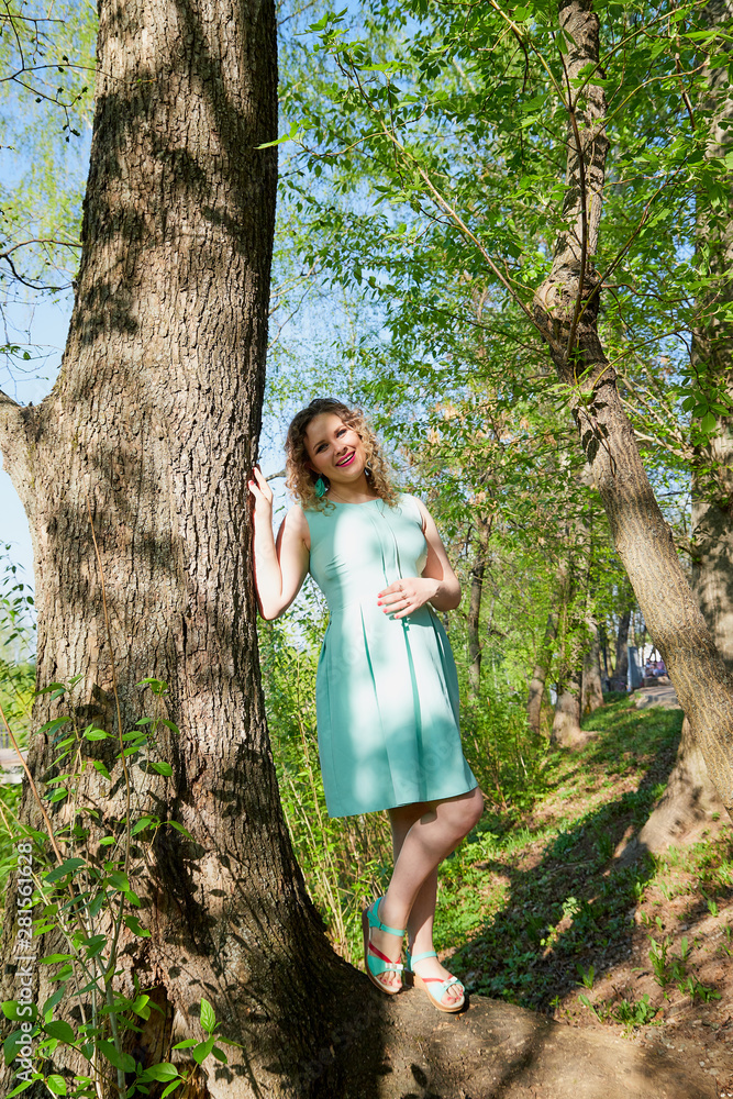 Portrait of beautiful cute girl in summer or spring park Portrait of beautiful cute girl in summer or spring park