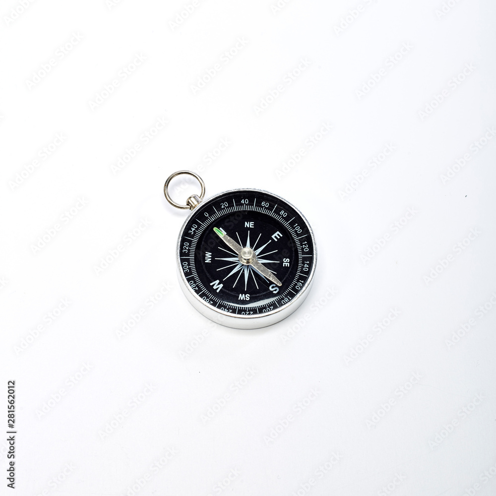 Close-Up Of Navigational Compass On White
