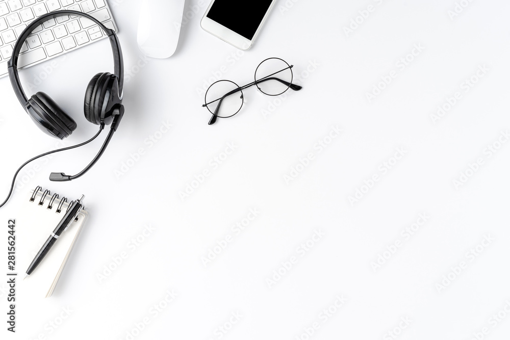 Customer service desktop with headset and accessories. Call center concept Customer service desktop with headset and accessories. Call center concept