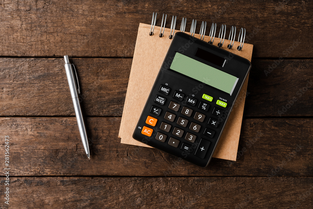 Calculator, notebook and pen. Business background Calculator, notebook and pen. Business background