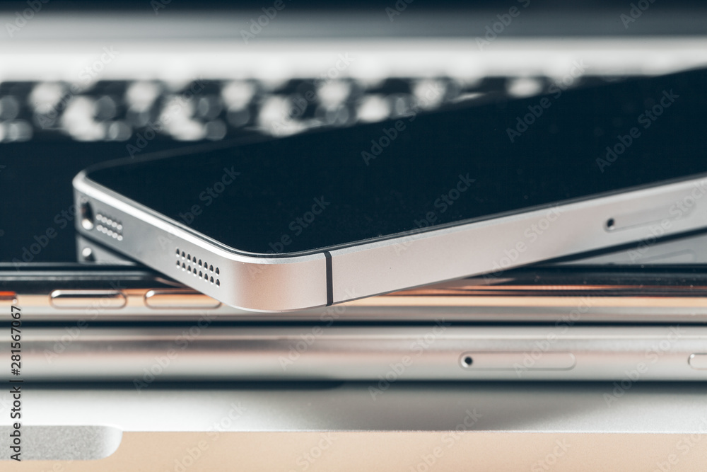 Laptop and mobile phone on the table. Workspace concept. Laptop and mobile phone on the table. Workspace concept.