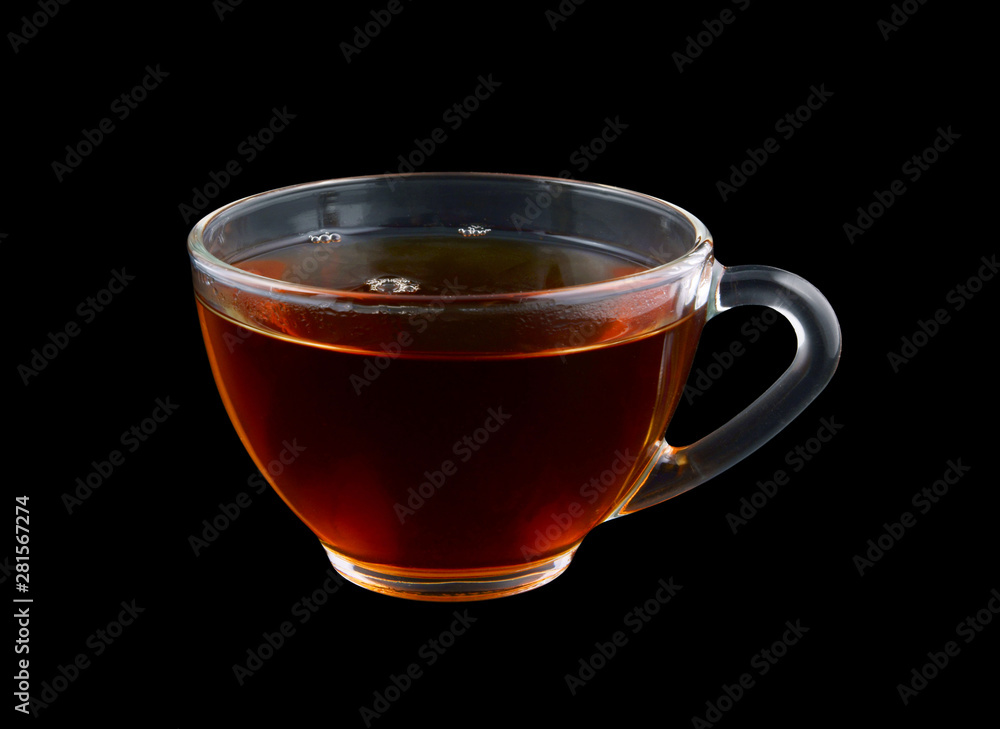 Fototapeta premium Glass cup of tea isolated on black