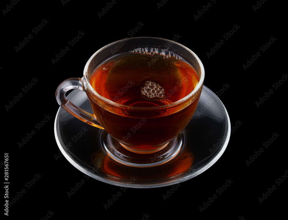 Glass cup of tea isolated on black Glass cup of tea isolated on black