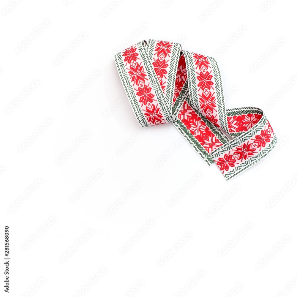Fototapeta premium Graphic concept with colour ribbon isolated on white background