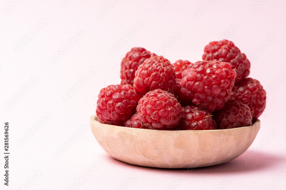 Macro view of red ripe raspberry fruits Macro view of red ripe raspberry fruits