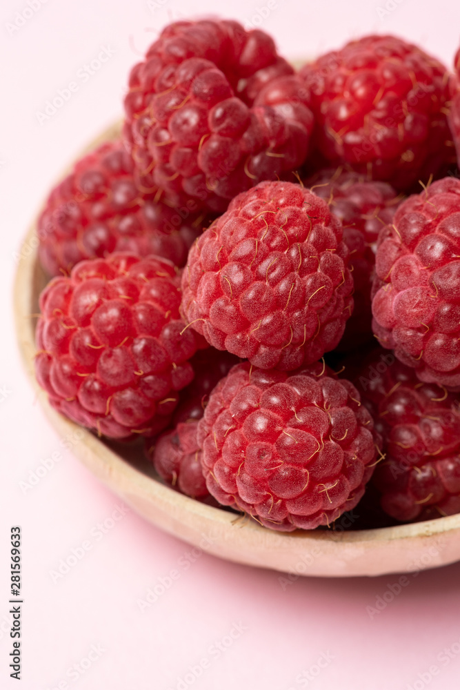 Macro view of red ripe raspberry fruits Macro view of red ripe raspberry fruits