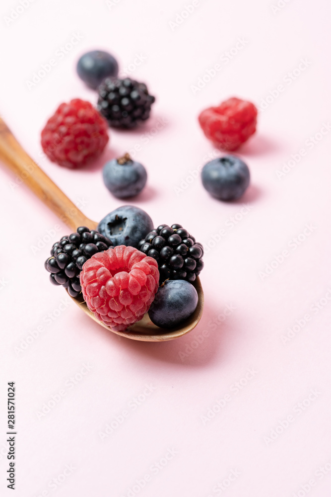 Macro view of different mix with ripe fruits in spoon Macro view of different mix with ripe fruits in spoon