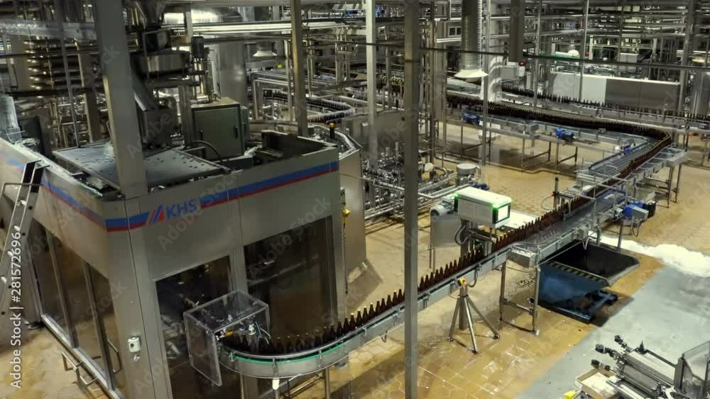 Beer factory interior with a lot of machines Beer factory interior with a lot of machines