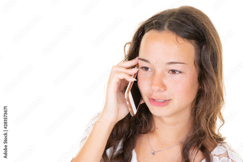 Young cute teenage girl talking on phone over white background Young cute teenage girl talking on phone over white background