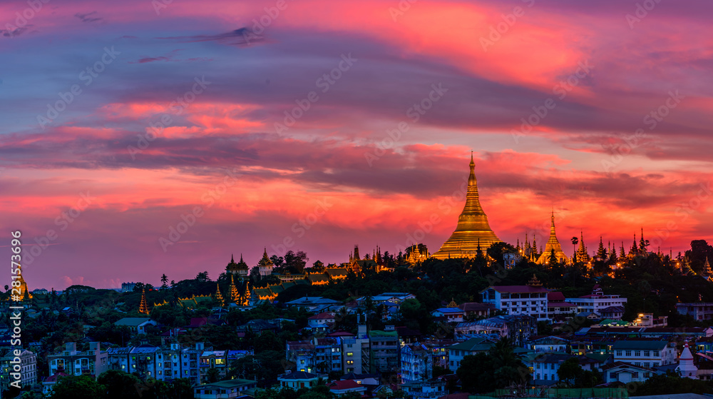 Shwedagon Pagoda is the biggest pagoda in Myanmar, the moment I shoot in great Sunset, Fire sky and golden color of Shwedagon pagoda stay in top of hill, houses at the down like the foundation for it