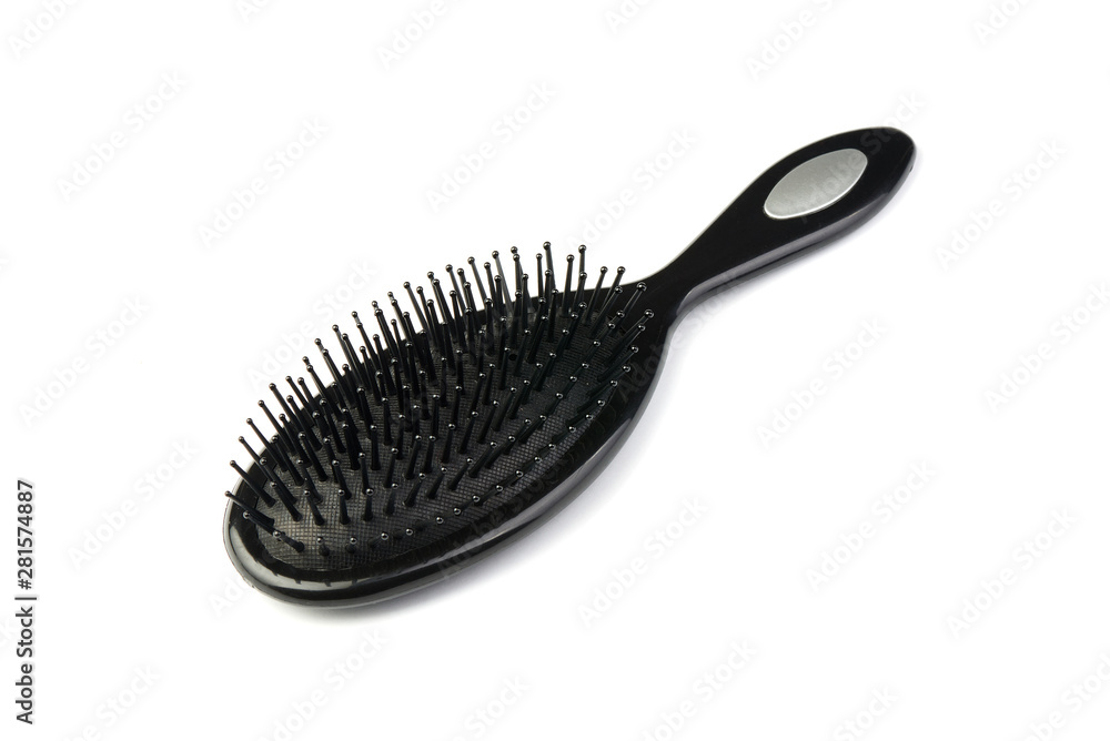 New modern hairbrush isolated on white background New modern hairbrush isolated on white background