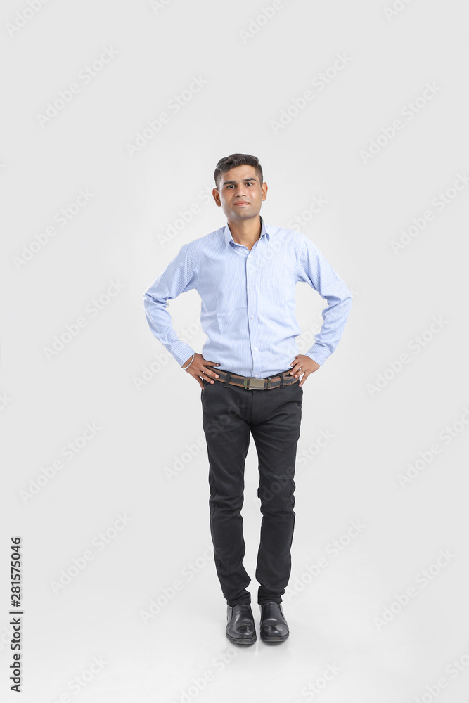 young indian man Standing over white background