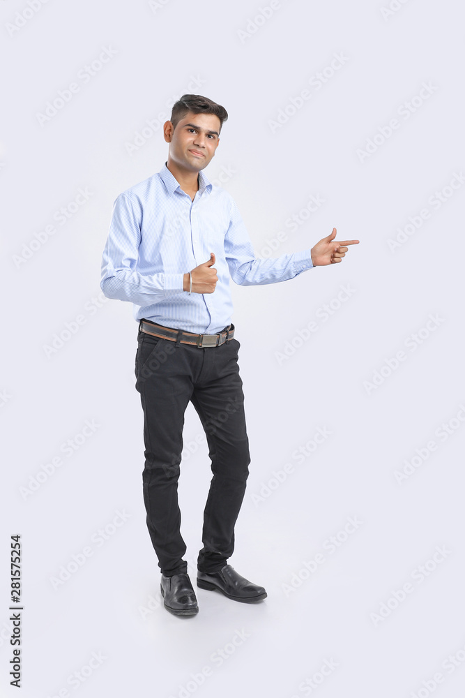 Young Indian Man Showing Direction With Hand Young Indian Man Showing Direction With Hand