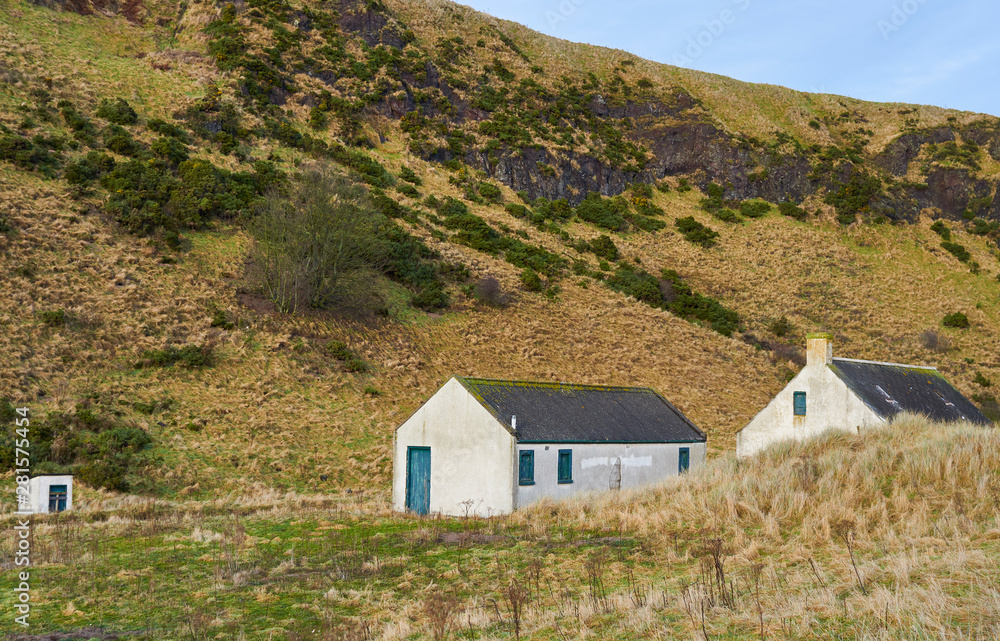Fishing Huts and Buildings behind the Dunes at the St Cyrus National Nature Reserve in Aberdeenshire, Scotland.