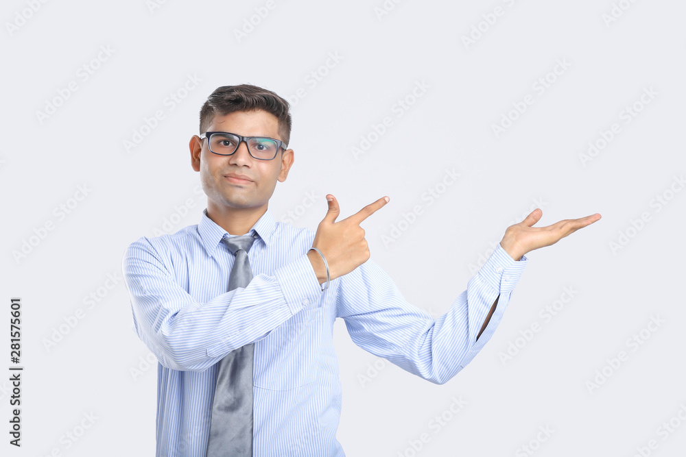 Young Indian Man Showing Direction With Hand Young Indian Man Showing Direction With Hand