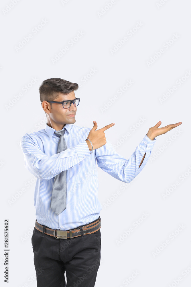 Young Indian Man Showing Direction With Hand Young Indian Man Showing Direction With Hand