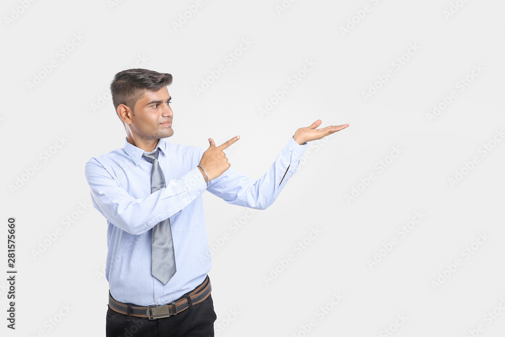 Young Indian Man Showing Direction With Hand Young Indian Man Showing Direction With Hand