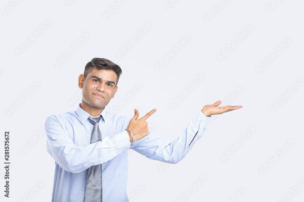 Young Indian Man Showing Direction With Hand Young Indian Man Showing Direction With Hand