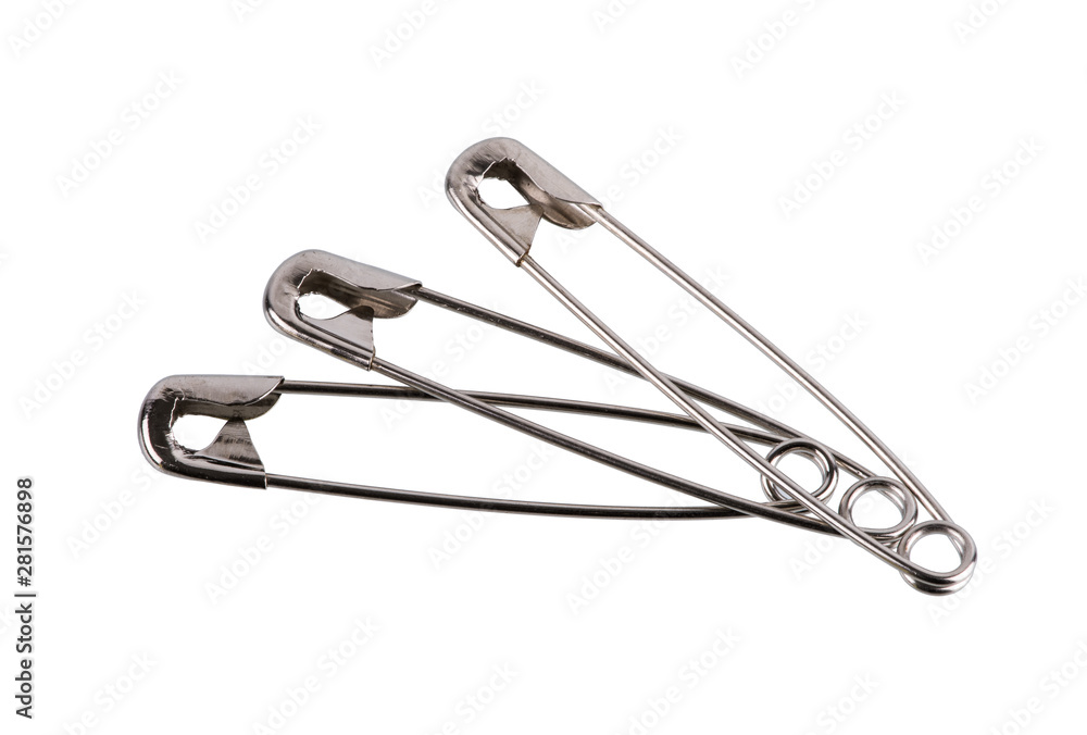 Safety pin brooch made from metal stainless isolate on white Safety pin brooch made from metal stainless isolate on white