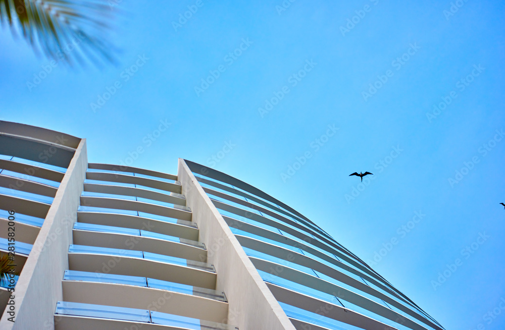 Skyscraper against the sky. Bottom view. Cancun. Skyscraper against the sky. Bottom view. Cancun.