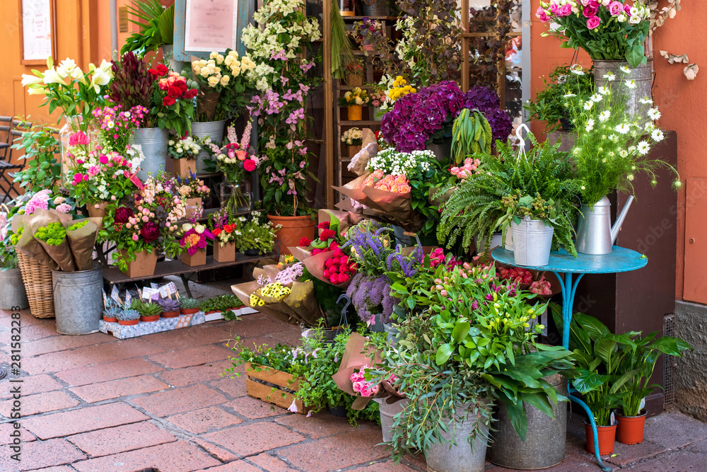 A variety of flowers on a street exhibition flower shop. Bologna, Italy.