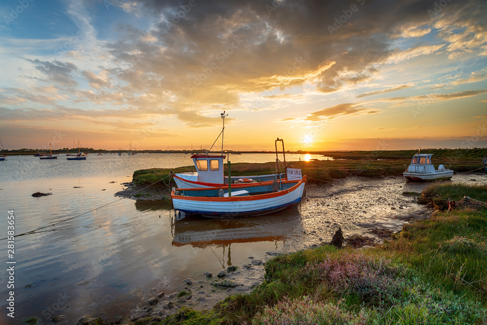 Beautiful sunset over fishing boats on the River Alde