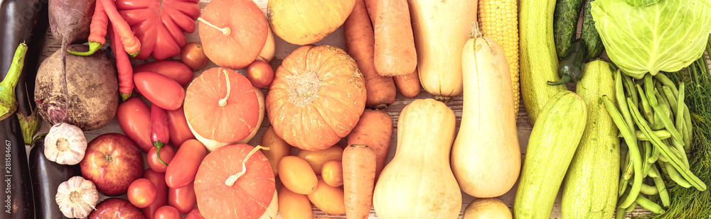 Healthy food background with autumnal vegetables and fruits. Autumn fruits vegetables and leaves. Thanksgiving day concept. Top view. Banner. Healthy food background with autumnal vegetables and fruits. Autumn fruits vegetables and leaves. Thanksgiving day concept. Top view. Banner.