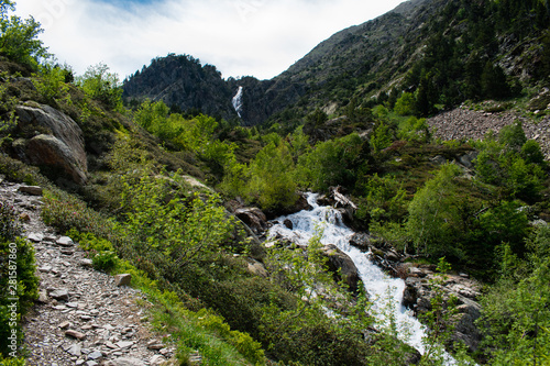 Landscape with waterfall in the mountains in summer at Parc Natural del Comapedrosa, Arinsal, Andorra photo