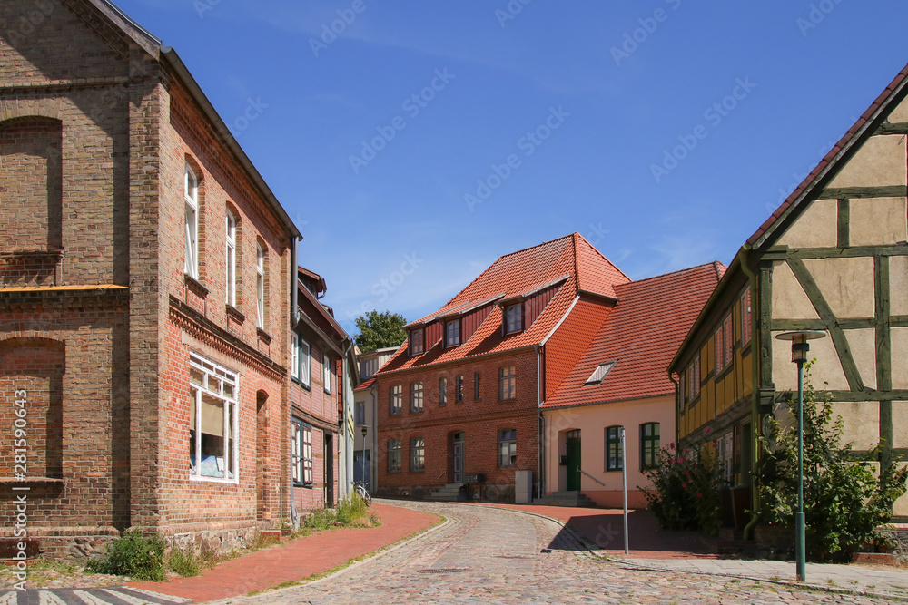 Historical architecture in a narrow alley of the holiday destination Plau on lake (Plau am See), Mecklenburg Lake Plateau, Germany Historical architecture in a narrow alley of the holiday destination Plau on lake (Plau am See), Mecklenburg Lake Plateau, Germany