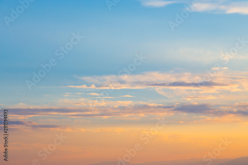Fototapeta Naklejka Na Ścianę i Meble -  Pink vanilla heaven. Bright blue sky with gentle cumulus clouds. soft pastel colors