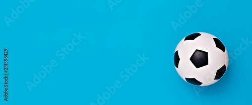 Soccer ball or football on blue background