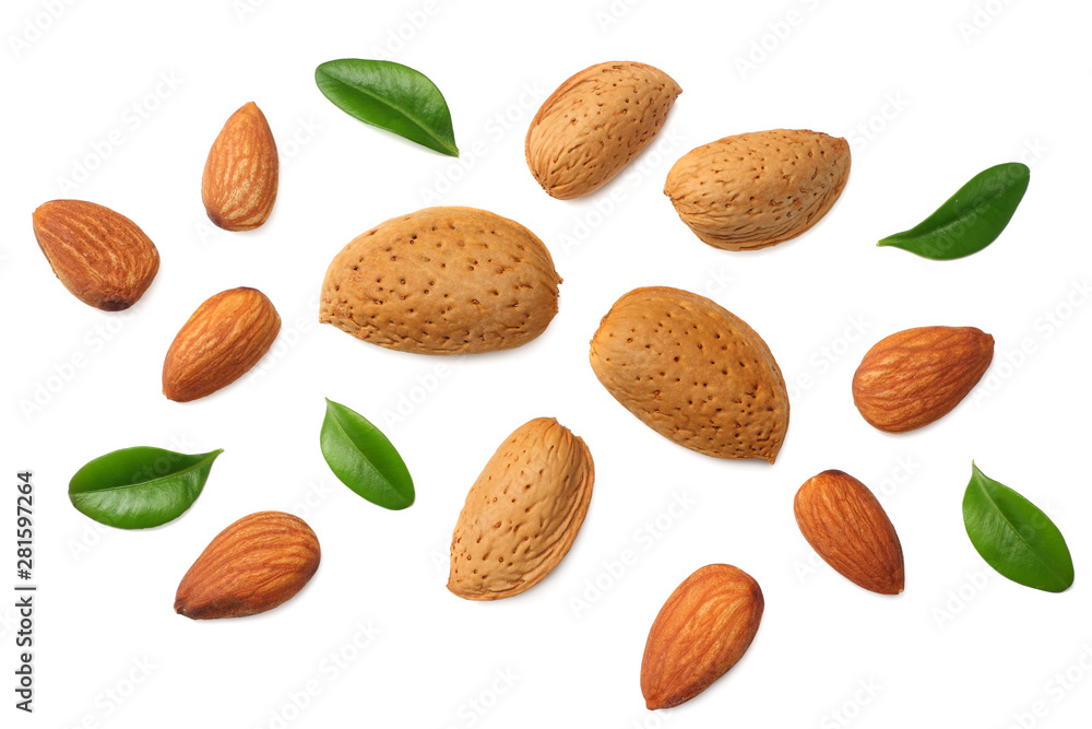 almonds with green leaves isolated on white background. top view. almonds with green leaves isolated on white background. top view.