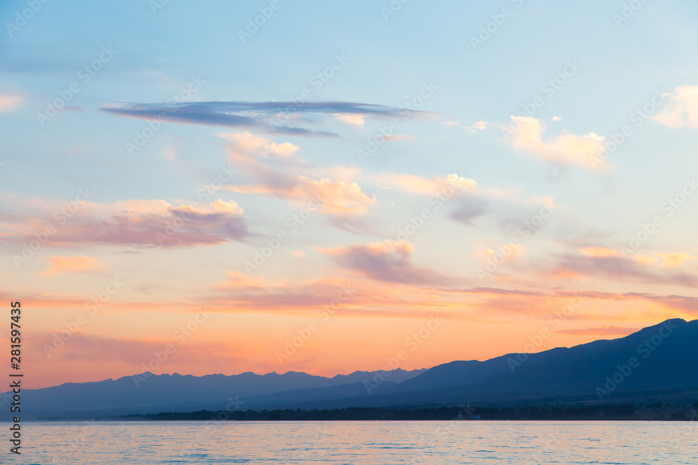 Fototapeta premium sky sunset sea. Beautiful clouds, soft colors. Natural background