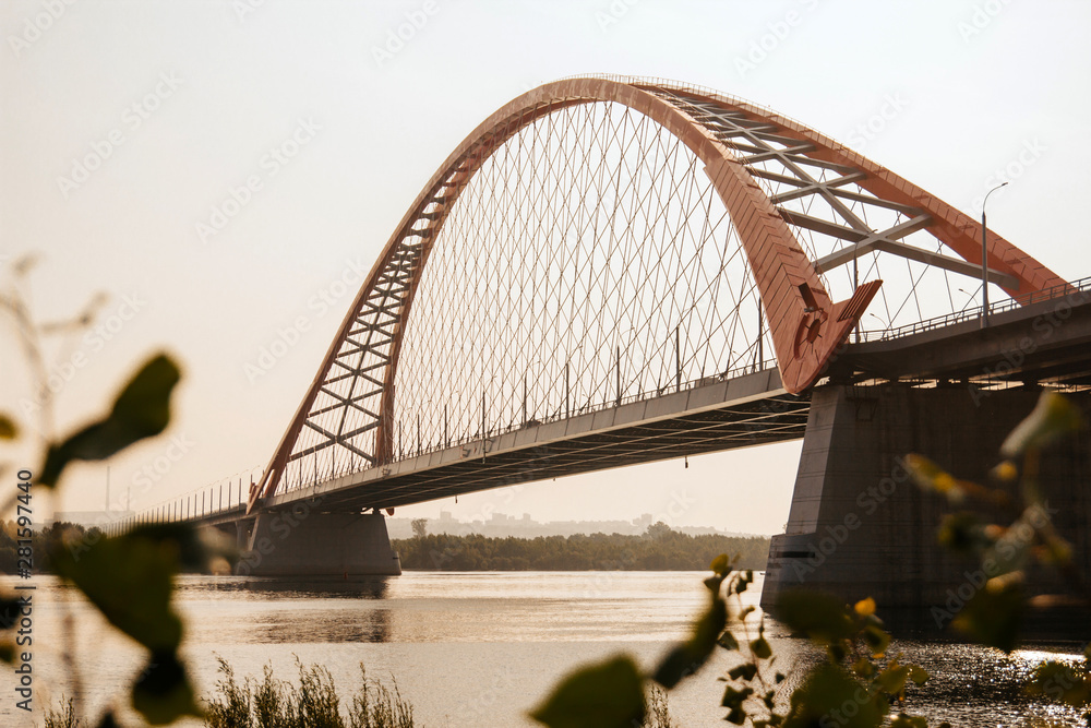  city ​​bridge over the river at sunrise
