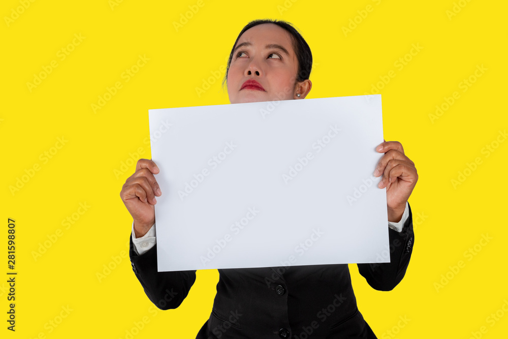 Communicate negative emotions, Business person holding a blank white paper in hand isolated on yellow background. Communicate negative emotions, Business person holding a blank white paper in hand isolated on yellow background.