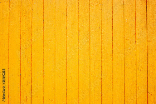 Wooden yellow wall texture. Grain wood background. Place for text. Texture for design. Bright wood photo