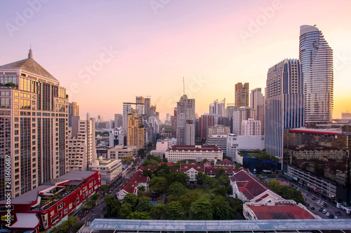 Panorama of landscape with sunset over the building and blue sky at bangkok  Thailand. View of the tall building in capital with twilight .Shot using Panorama technique.