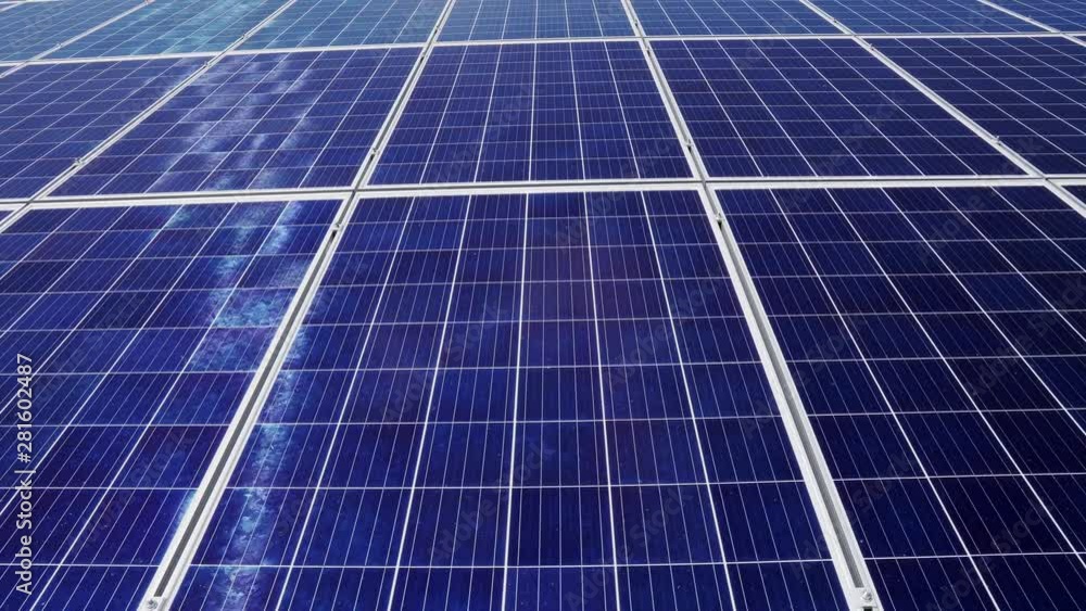 Photovoltaic cells of solar panels in a solar power station. Close-up. Photovoltaic cells of solar panels in a solar power station. Close-up.