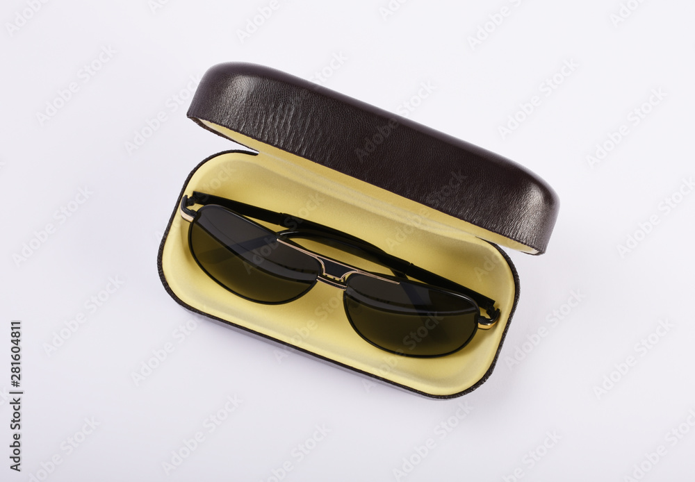 Sunglasses in a glasses case isolated on white Sunglasses in a glasses case isolated on white