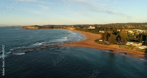 Wallpaper Mural Sandy beach tip with Mona Vale rock pool in high tide waters of pacific ocean seen from above in aerial panorama. Torontodigital.ca