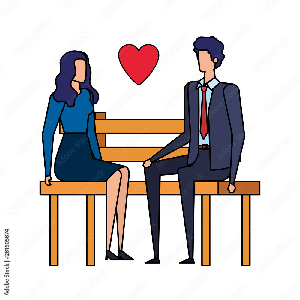 Obraz premium business couple lovers seated in the park chair with heart
