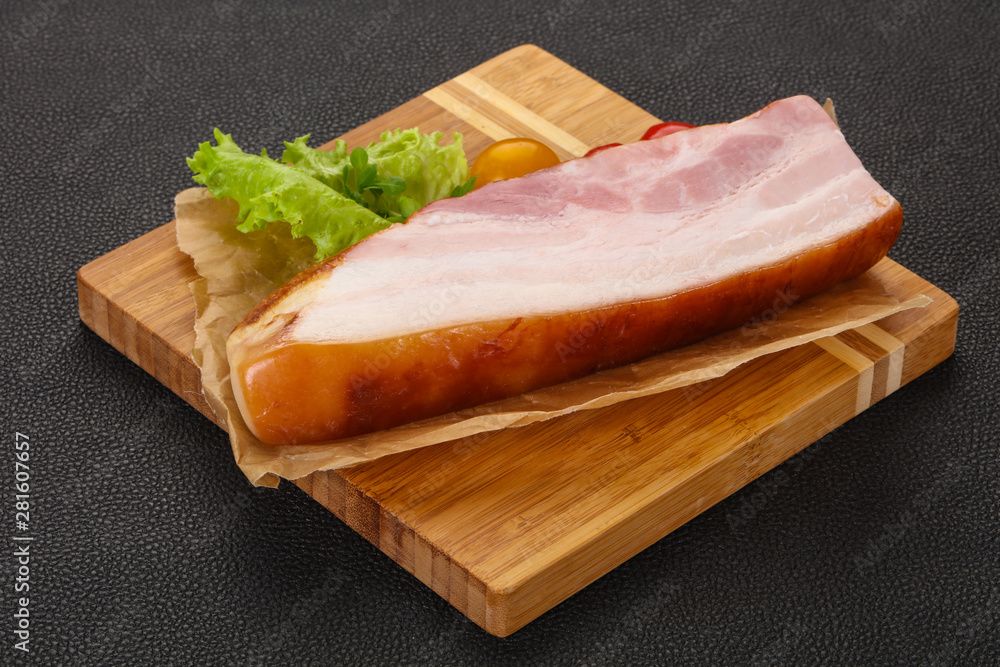 Smoked pork breast with salad leaves