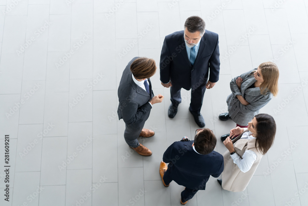 Top view of business people. Business meeting and teamwork. - obrazy, fototapety, plakaty 