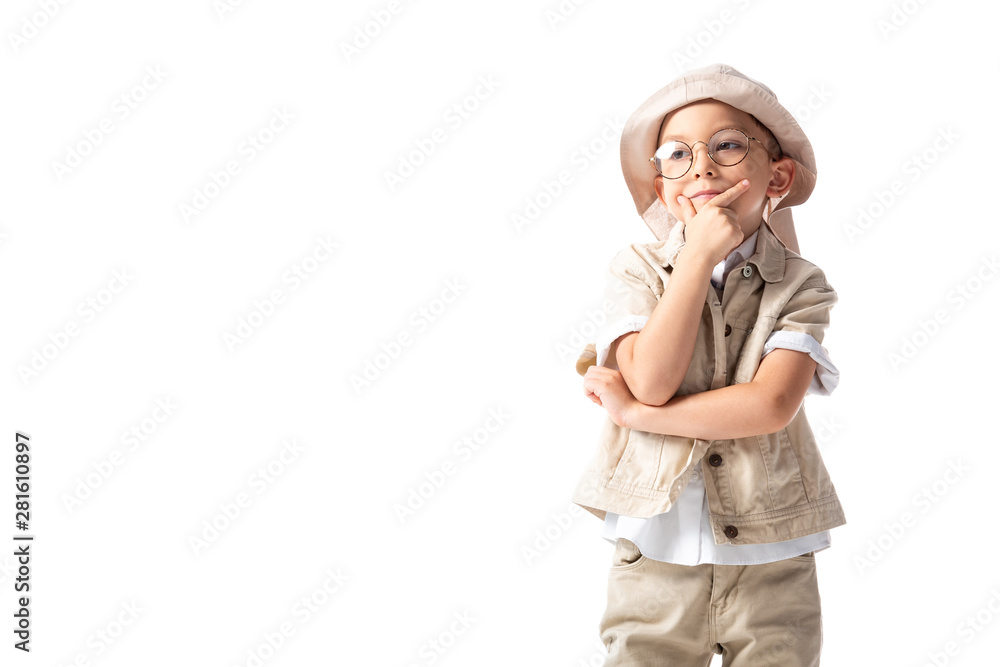 pensive explorer boy in glasses and hat touching chin and looking away isolated on white pensive explorer boy in glasses and hat touching chin and looking away isolated on white