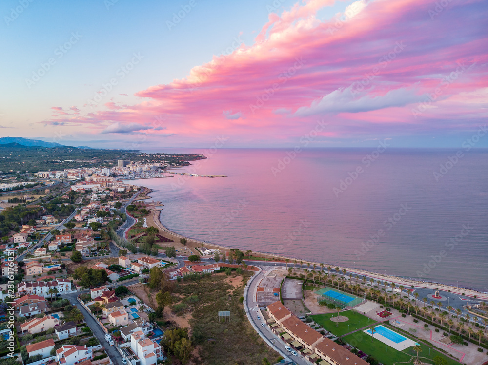The incredible sunset over L'Ampolla, Catalonia, Spain. Drone aerial photo